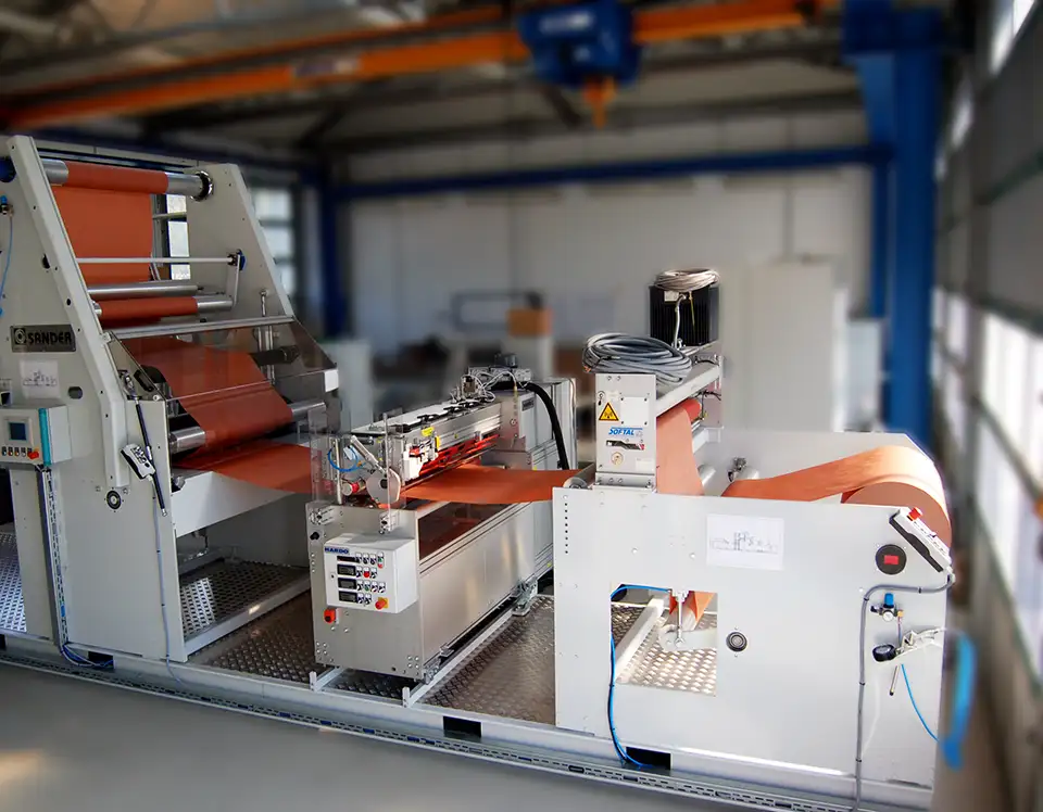 Umroll- und Kaschiermaschine für Baufolien